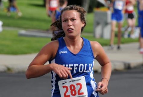 Sophomore Bridget Evangelista (above) finished the 5K womens race with a time of 21:44 at the Lt. Travis J. Fuller Invt.