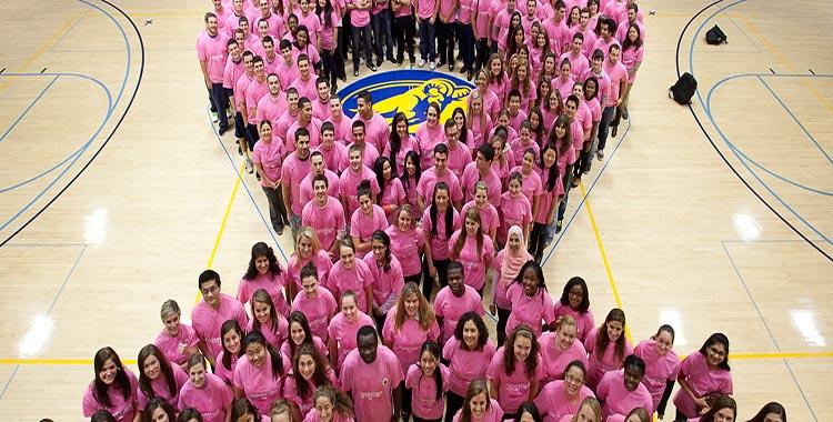 Suffolk Kicks off Breast Cancer Awareness Week With Human Pink Ribbon