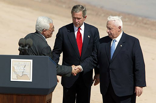 Sharon (right) with former U.S. President George W. Bush (center) and Palestinian statesman Mahmoud 
Abbas (left) in June 2003
(Photo courtesy of Wikimedia Commons)