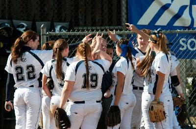 The softball team prepares for their match.
(Photo courtesy of Suffolk Athletics)