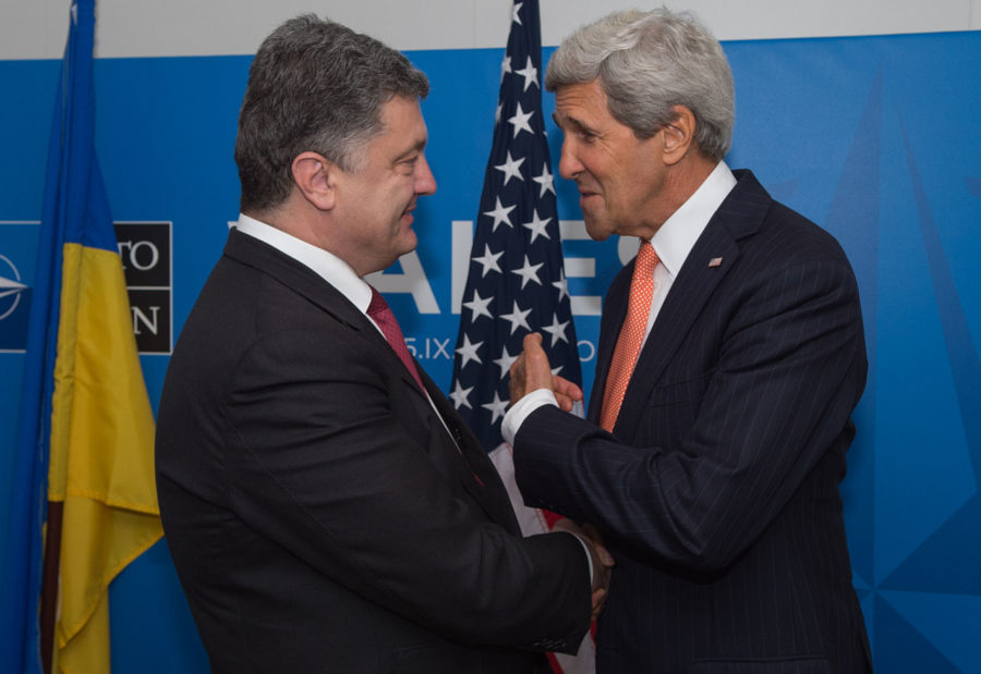 U.S. Secretary of State John Kerry and Ukrainian President Petro Poroshenko at NATO summit.
(Photo courtesy of Wikimedia Commons)