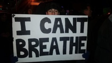 Protesters storm city streets during annual tree lighting