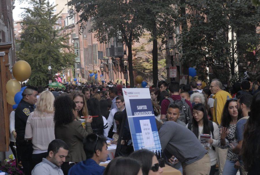 Suffolk University students packed Temple Street during the last involvement fair the school will host on it. Craig Martin/Journal Staff.