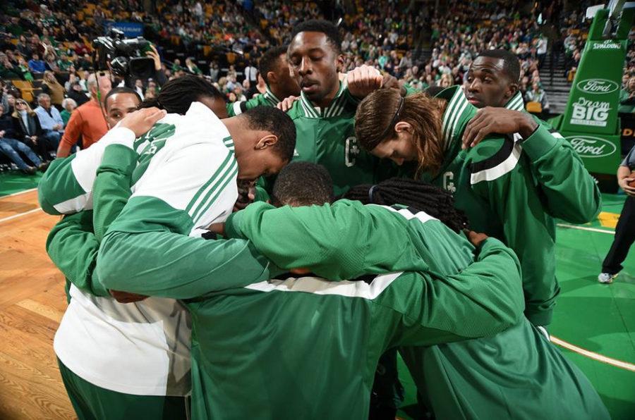 Boston Celtics huddle before a game. Courtesy of Boston Celtics’ Facebook