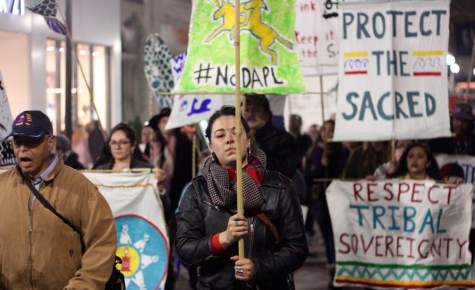 United protestors march in stampede through downtown