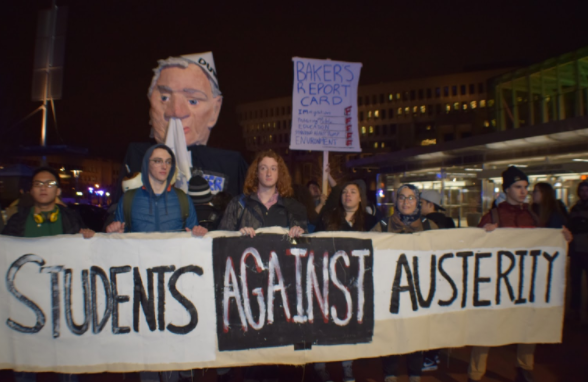 Some at the protest believe President Donald Trump and Massachusetts Governor Charlie baker have a tight agenda for the state of Massachusetts, and they want to reject that. 

Morgan Hume/ Journal Staff
