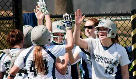 Softball swings into new season, catches warm weather