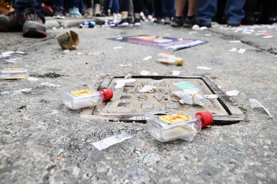 Empty nip bottles line the sidewalk of Tremont St. and other areas of Boston following the Red Sox World Series Parade in late-Oct., 2018.