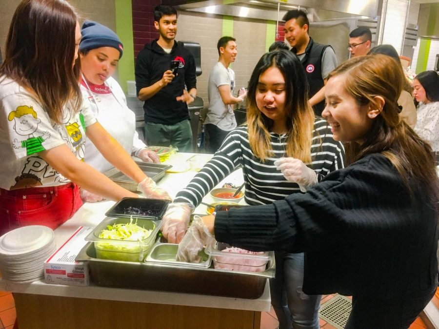 Asian American Association, Vietnamese Student Association and Off Campus Housing Office participate in Cooking 101: Roll into Spring