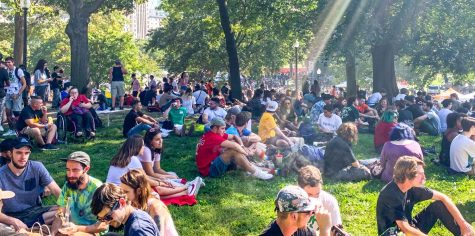 Boston Freedom Rally attendees relax the day-long festival on the Boston Common