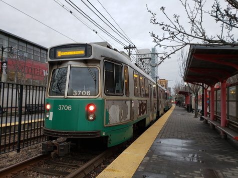 A Green Line Train stopped at Northeastern University outbound MBTA stop