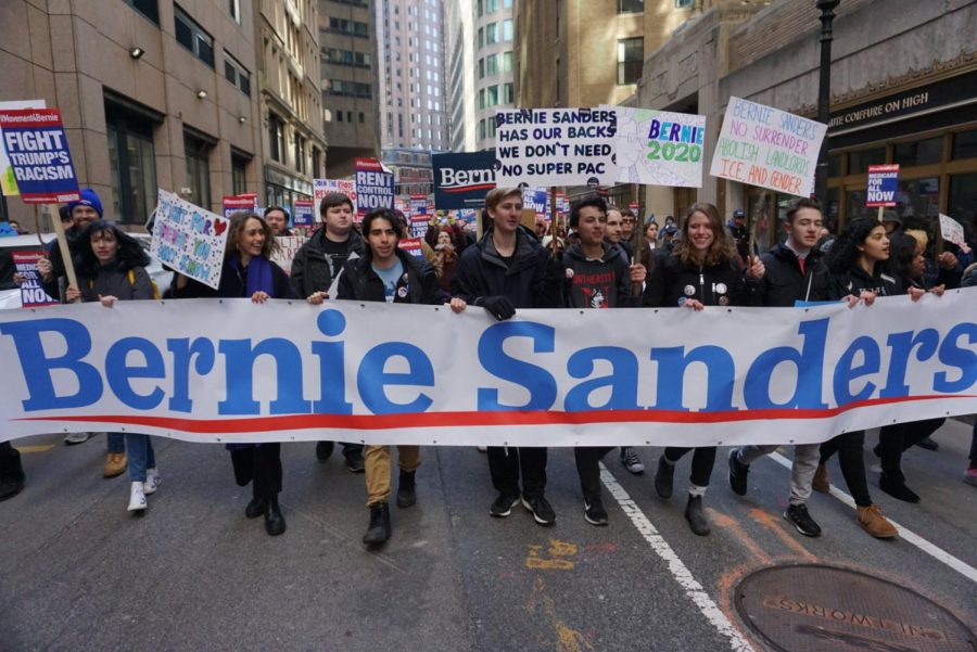 Sanders supporters rally, march in Boston ahead of Mass. primary