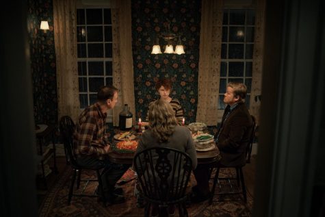 David Thewlis as Father, Jessie Buckley as Young Woman, Toni Collette as Mother, and Jesse Plemons as Jake in an unsettling dinner scene in Charlie Kaufman's