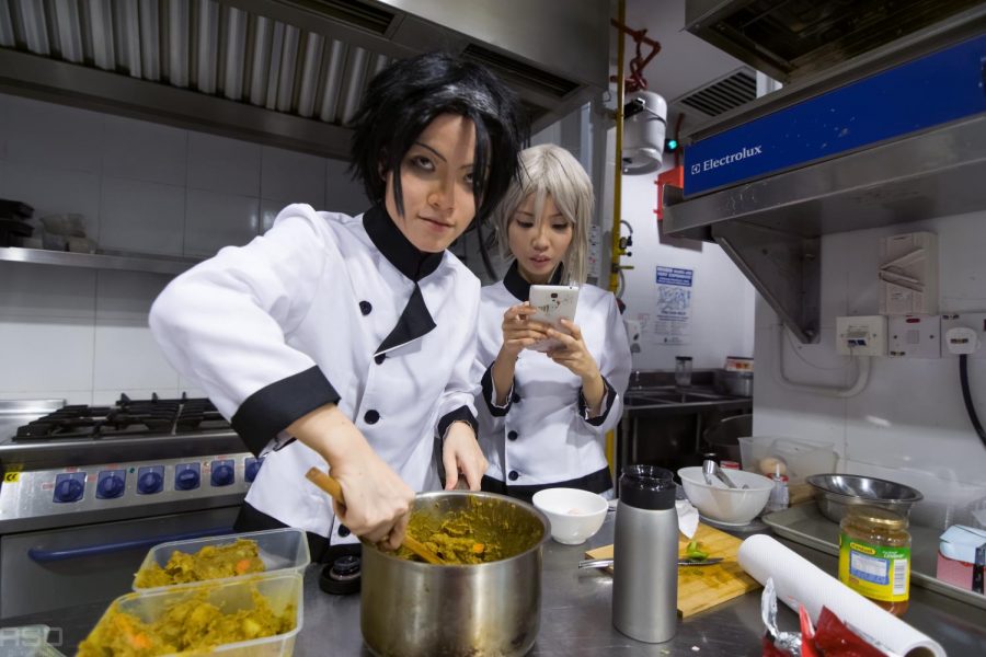 Two girls reenact "Food Wars!: Shokugeki no Soma."