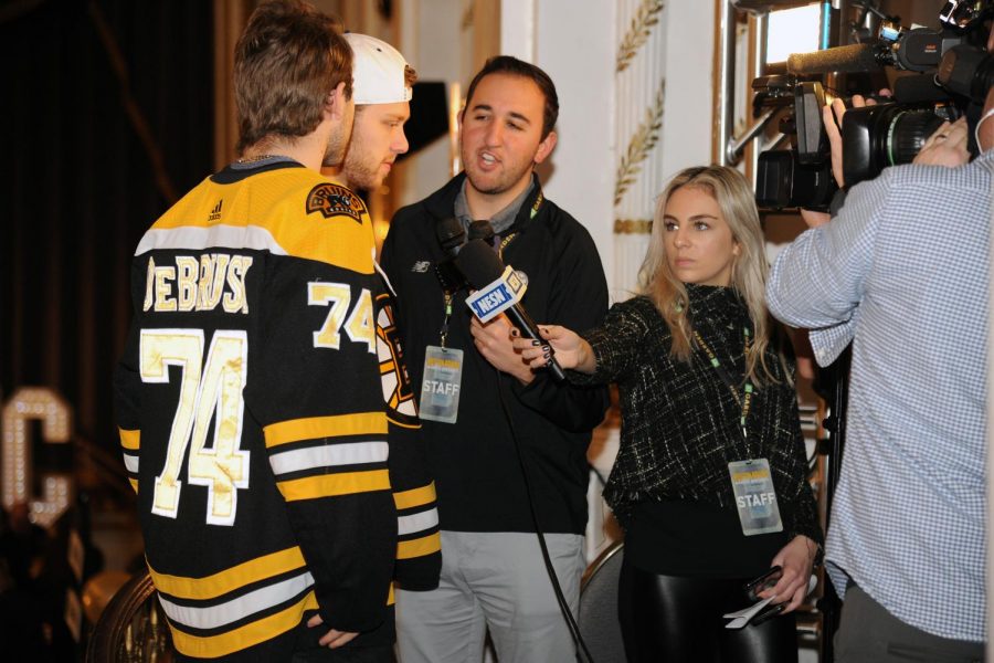 Eric+Russo+interviews+Bruins+players+Jake+Debrusk+and+David+Pastrnak