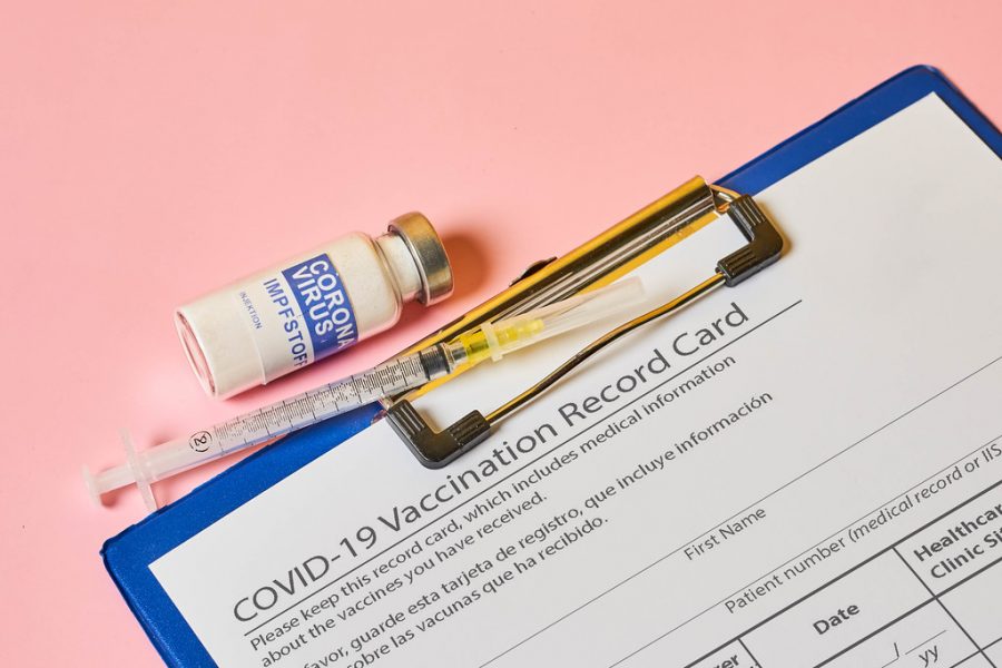 Opinion: Think twice before posting your vaccine card