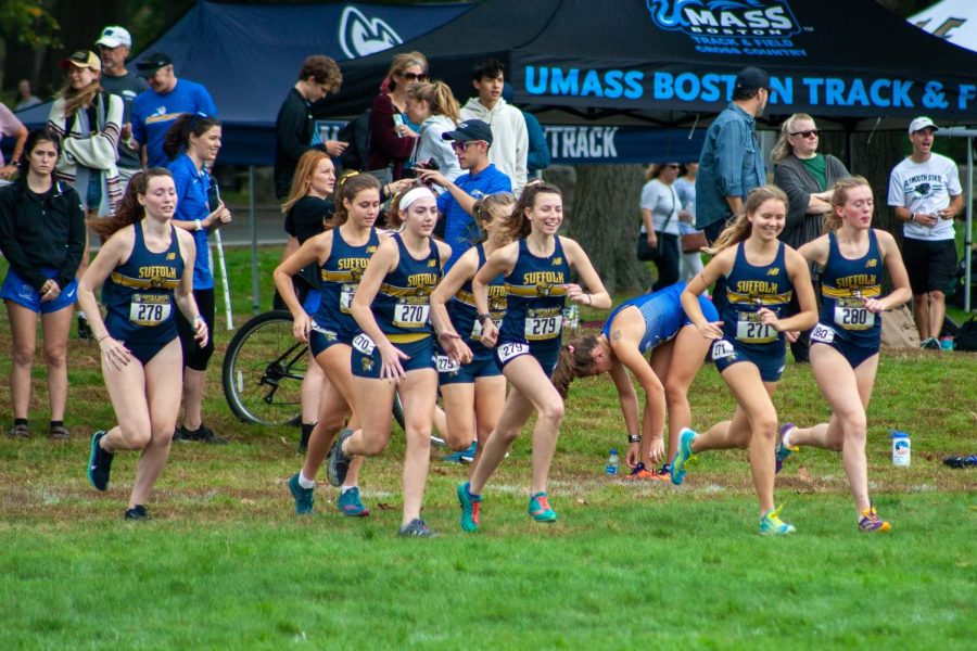 Members of the womens cross country team at the Franklin Park Invitational on Oct. 16