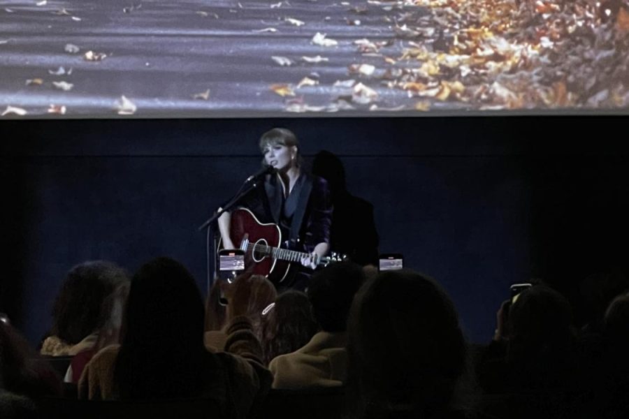 Taylor Swift singing at the premiere of All Too Well: The Short Film on Nov. 12 in New York City to celebrate the release of Red (Taylors Version).