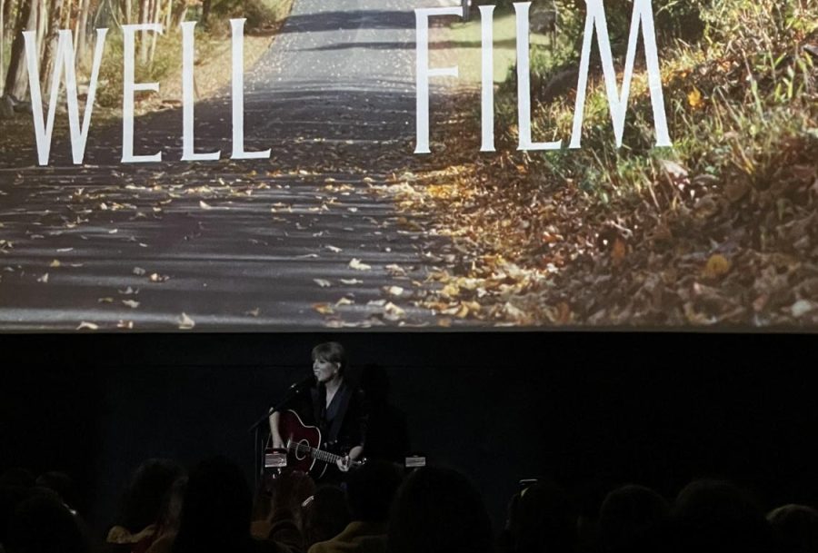 Taylor Swift singing at the premiere of All Too Well: The Short Film on Nov. 12 in New York City to celebrate the release of Red (Taylors Version).