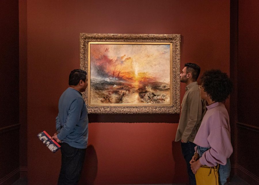 Vistors examine Slave Ship (Slavers Throwing Overboard the Dead and Dying, Typhoon Coming On) from 1840, oil on canvas.