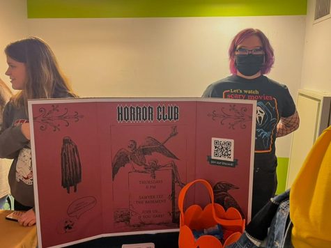 SU Horror Clubs vice president Kathleen Fahey represents the spook-tacualr group at this semesters Involvement Fair. 