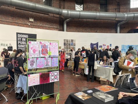 Local authors and vendors promote their art and books at the Boston Book Art Fair. 