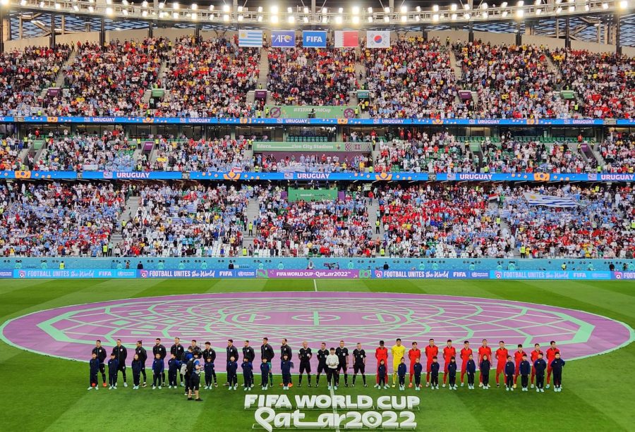 Players gather before the Korea-Uruguay match.