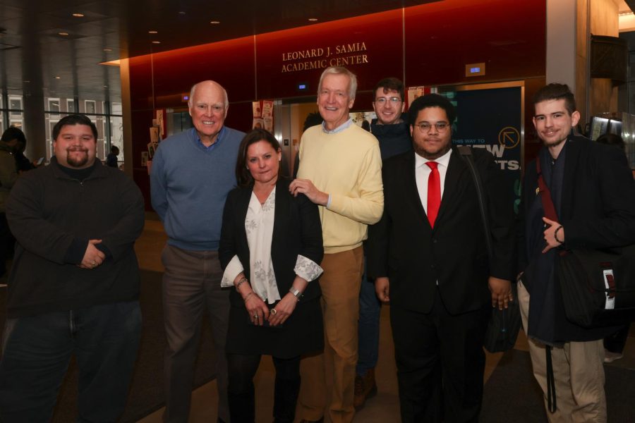 Former+Reps.+James+Coyne+and+Peter+Kostmayer+pose+with+Prof.+Christina+Kulich+and+political+science+students.