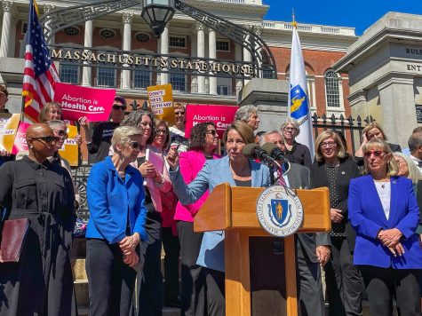 Massachusetts Governor Maura Healey speaks at a press conference outside the State House