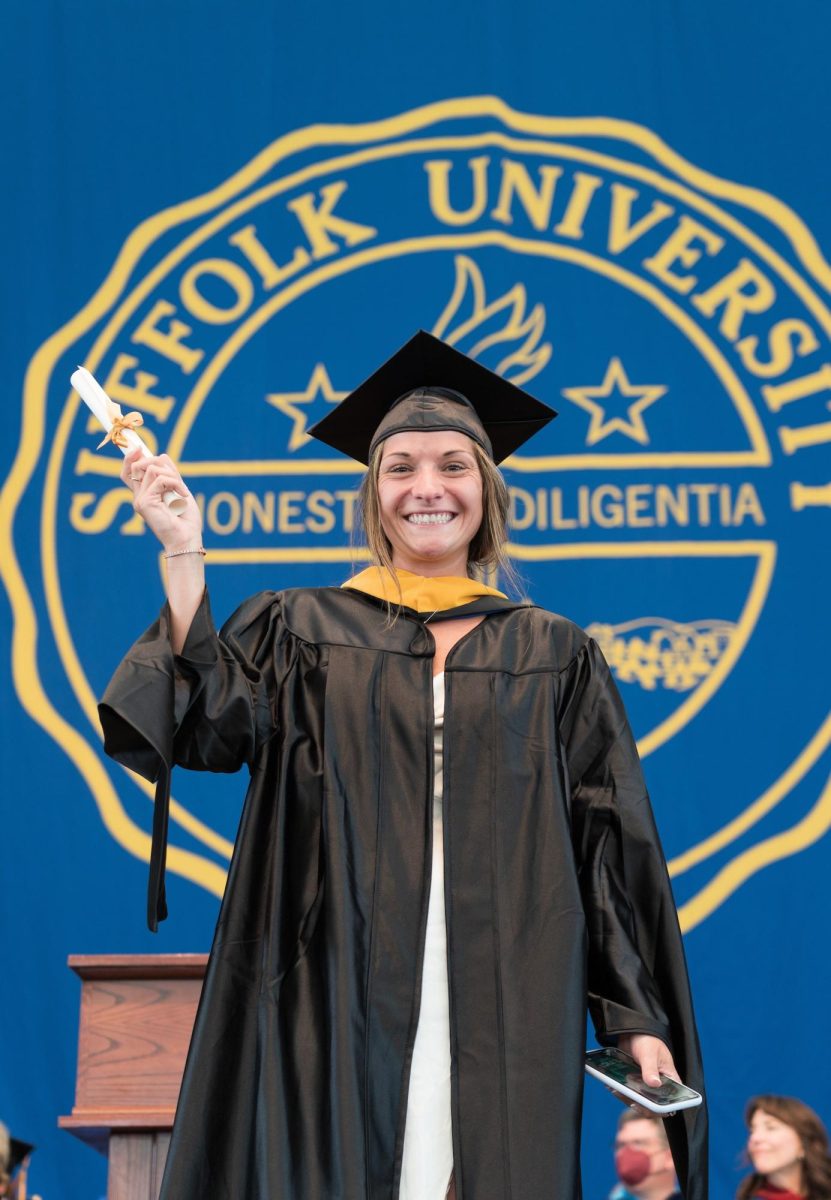 Former womens basketball guard Jenni-Rose DiCecco receives her degree at commencement in 2022. DiCecco is the womens basketball programs all-time leading point scorer.