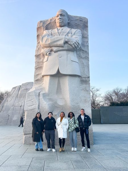 Kiara Deburgo, Jaylen Gomez, Cherina Wright, Kayci Resende-Abbott and Selvin Backert pose in front of the Martin Luther King Jr. monument in Washington D.C. Courtesy of Selvin Backert