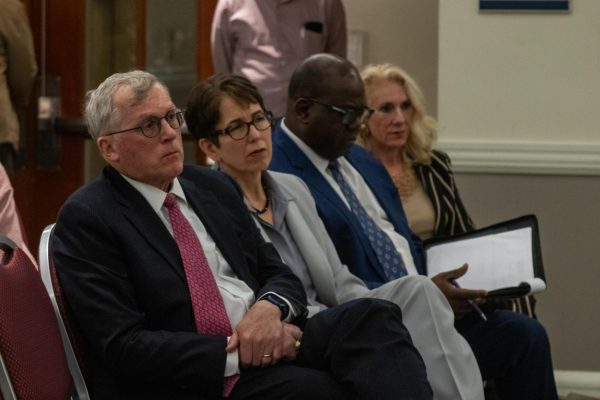 From left to right, Board of Trustees Robert Lamb, Suffolk President Marisa Kelly, Board member Ernst Guerrier and Vice Chair of the Board Amy Nechtem listen to student feedback during the March 26 forum.
