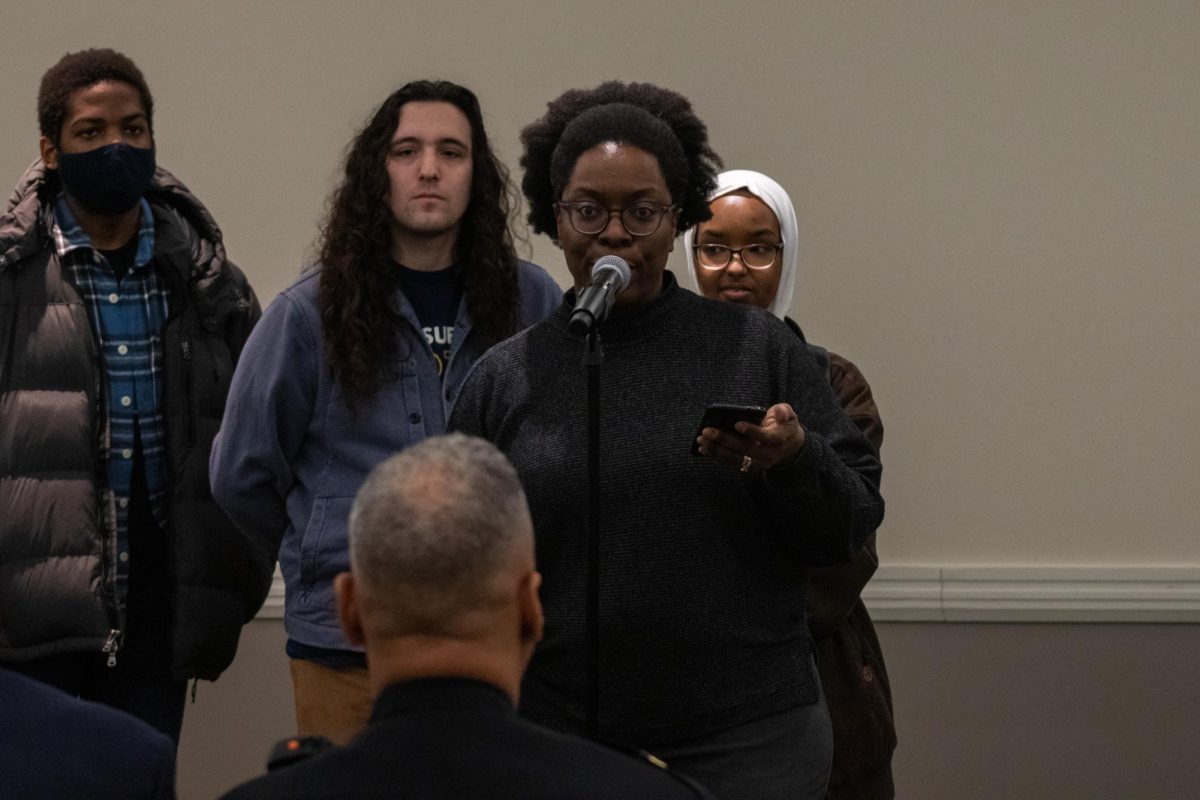Suffolk Law student Faye Golden speaks at the student forum March 26. Golden has survived four school shootings throughout her career as a teacher.