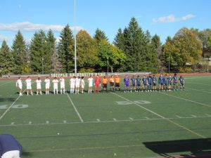 Suffolk University and Roger Williams University men's soccer starters lined up before a Oct. 26 matchup.