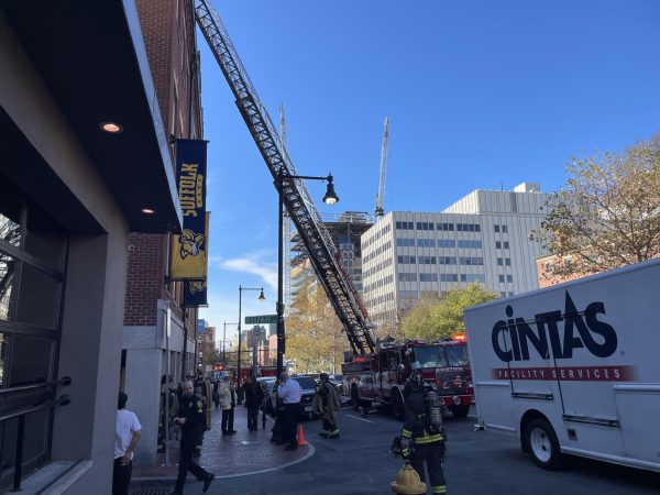 Boston Fire Department engines with raised ladders outside the Ridgeway Building.