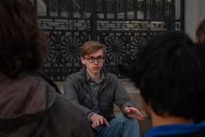 Freshman Joey Pisani speaks to students at a vigil outside the Massachusetts State House Nov. 9.