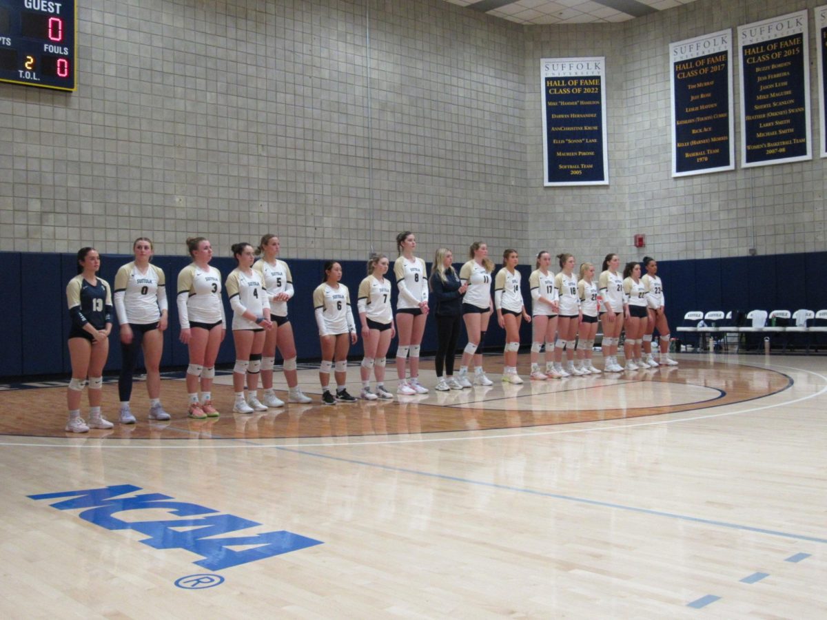 The Suffolk University volleyball team lined up before a matchup against Western New England University Nov. 12.