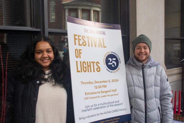 Asma Akbar, the Interfaith Scholar, and Amichai Levy, staff advisor to Suffolk Hillel at the Festival of Lights. 