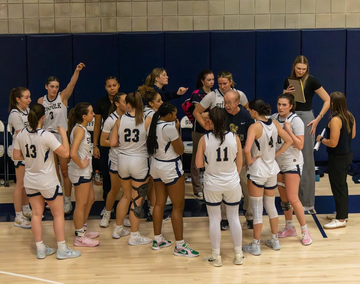 Women's basketball head coach Ed Leyden addresses the team during a game against the University of New England Jan. 28. (courtesy of Sophia DiNanno)