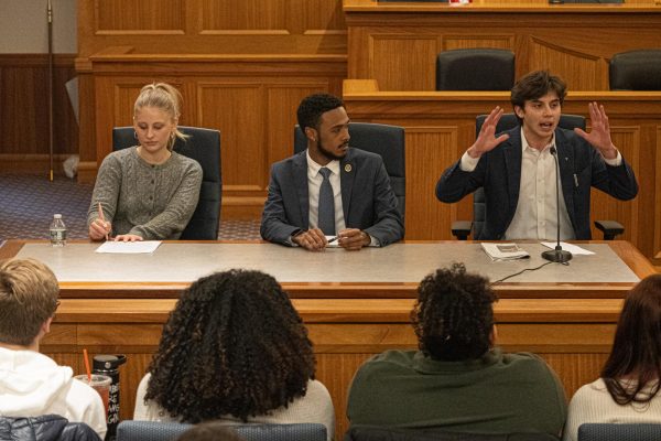 SGA presidential candidates Ruby Walsh, Andrew Gomes and Charlie Reyna-Demes speak at the candidates forum.