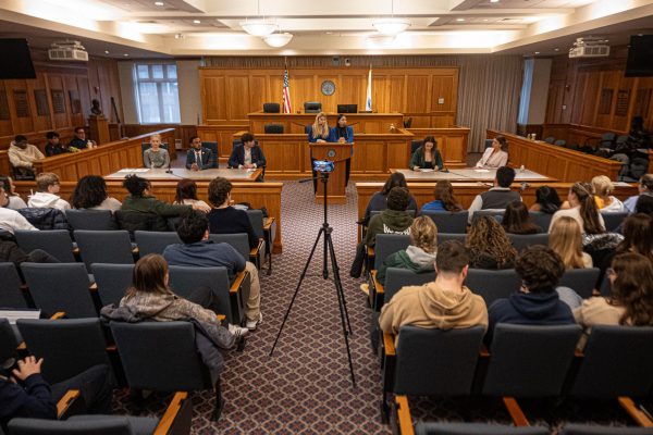 Student Government Association E-board candidates at the candidates forum Feb. 27, held in the Moot Court Room in Sargent Hall.