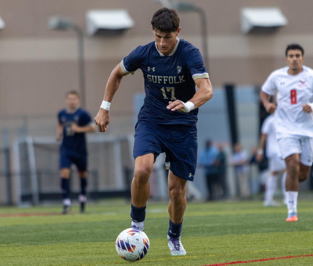Sophomore forward Dylan Tratchenberg advancing up the field with the ball during a Sept. 13 game against the University of Hartford.