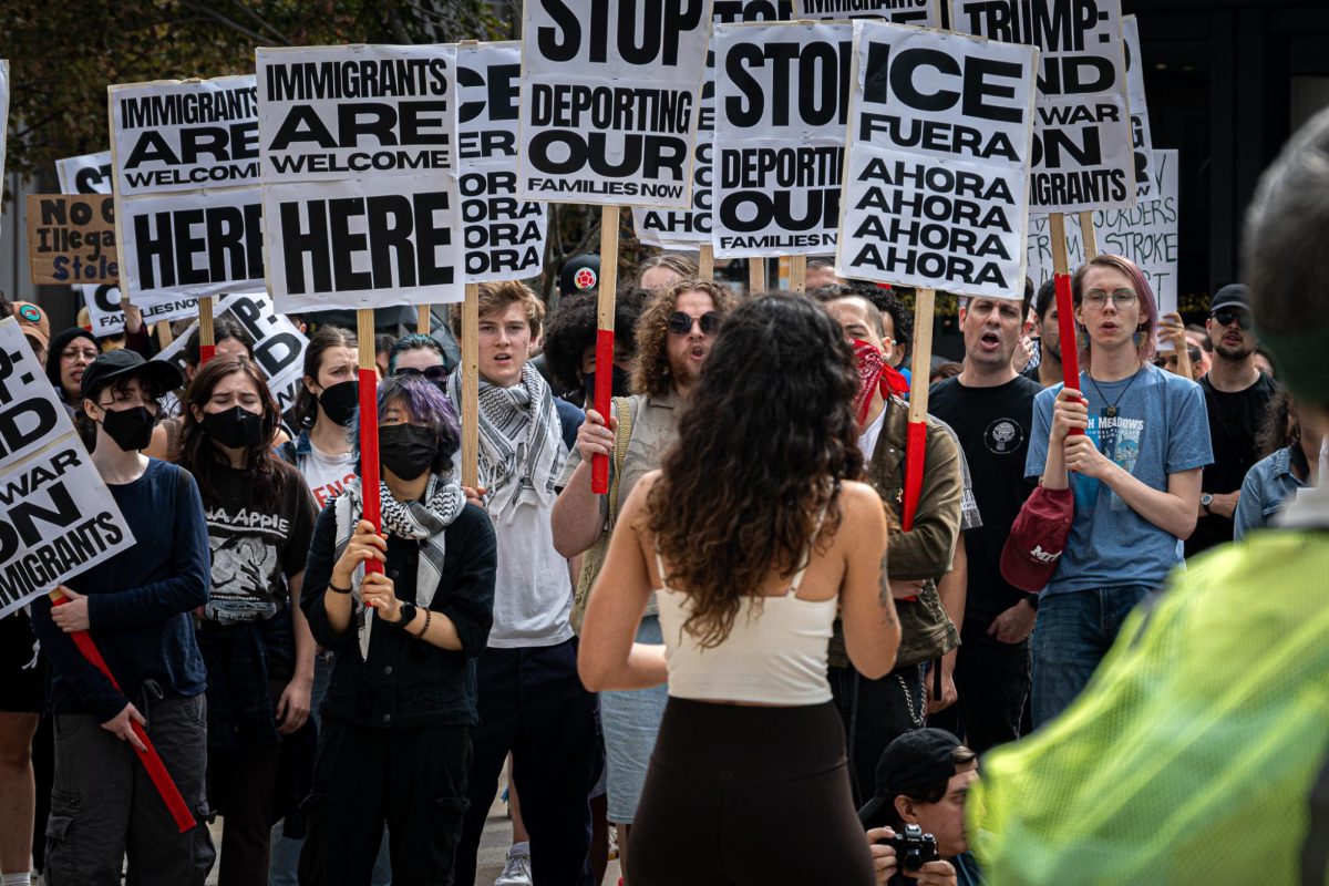 Around 70 demonstrators gathered on Sept. 13 to listen to speakers at an anti-ICE protest. 