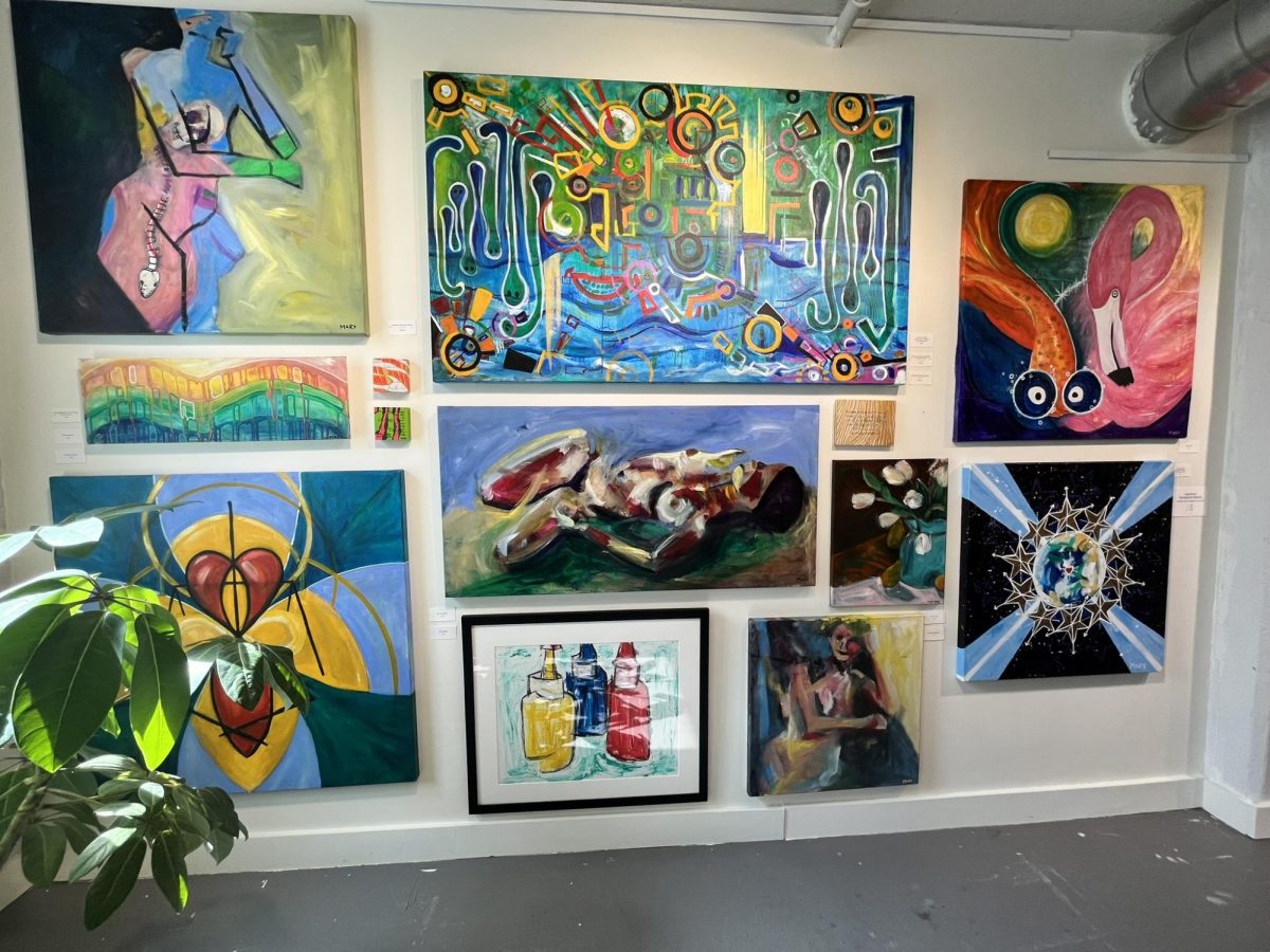 Various paintings by Mary Fries on display at the South End Open Studios.