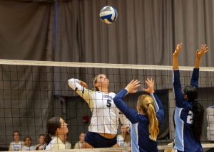 Grace Cervenka rising to hit the ball (courtesy of Grace Cervenka).