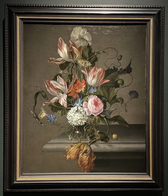 "Flowers in a Glass Vase on a Stone Table Ledge" by Anna Ruysch about 1690s.
