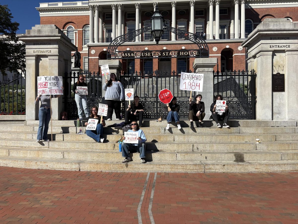 Members of the Venture Literary Magazine gather outside Mass. State House to protest banned books. 