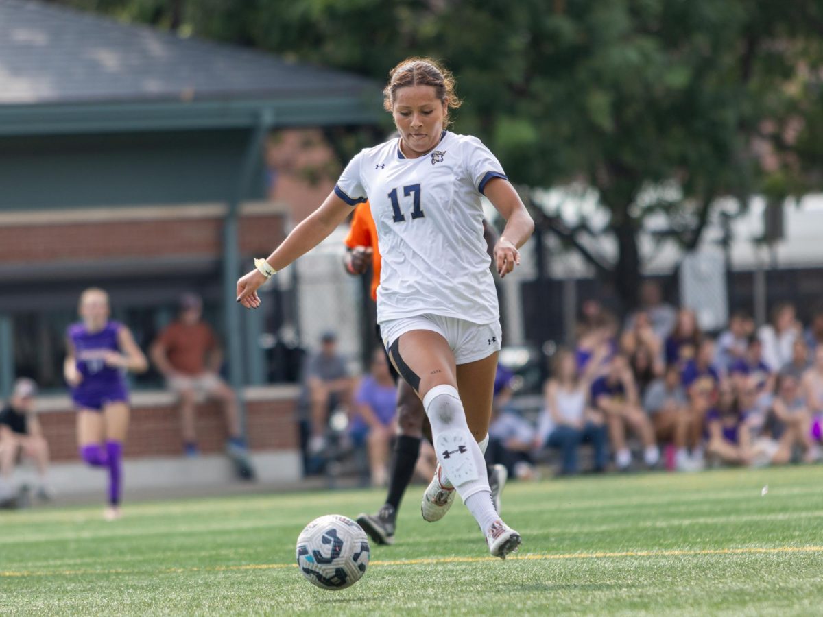 Sophomore midfielder Sophia Vazquez advancing up the field with the ball.