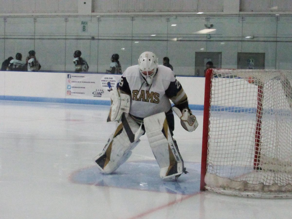 Katelyn Michals defends the goal during a game as Suffolk's starting goalie.