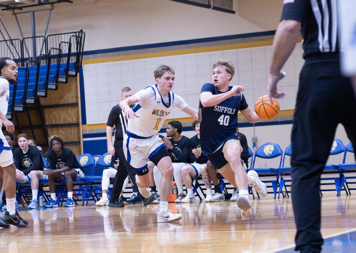 Hatcher Nordquist drives toward the net during a Jan. 28 game against Johnson & Wales University.